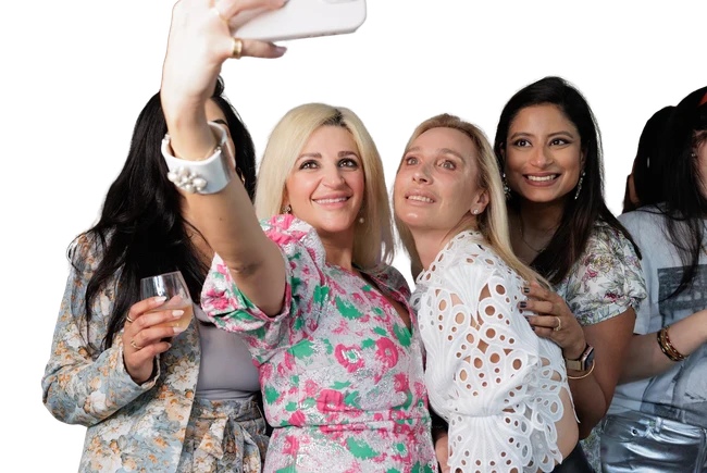 Women of the I Want Her Shoes community taking a selfie at an event